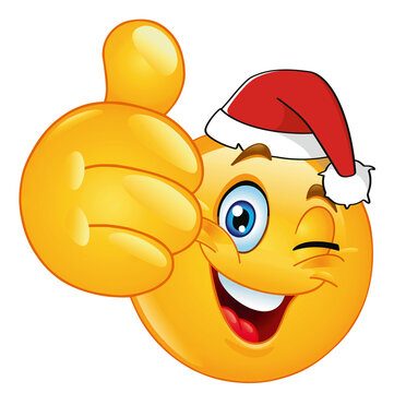 A cheerful winking yellow smiley face with thumbs up and wearing a New Year's red hat