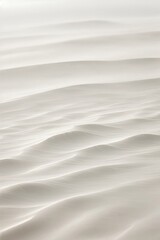 A white desert with sand against the sky, copy space for text and advertising.