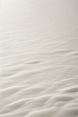 A white desert with sand against the sky, copy space for text and advertising.