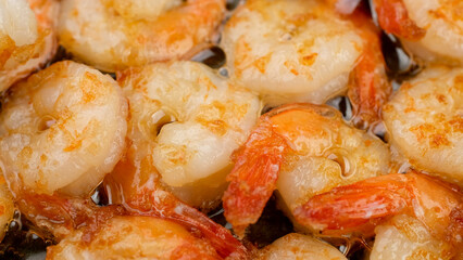fried shrimps in pan, close up