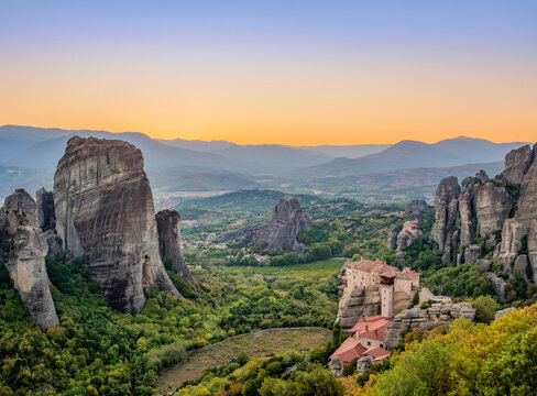 Monasteries of Rousanou and Saint Nicholas Anapafsas at dusk, elevated view, Meteora, Thessaly, Greece
