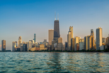 Sunset view over downtown skyline from Lake Michigan, Chicago, Illinois, USA