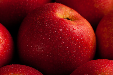 Red apples in water drops close-up, top vew 