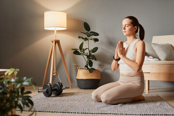 Health and wellness at home. Exercise on the floor. Lifestyle of wellness. Home meditation for...