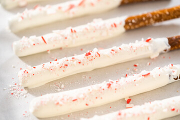 Candy cane chocolate covered pretzel rods