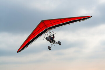 Red wing hang glider trike