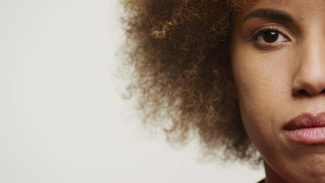 Half-Face Portrait of a Thoughtful Woman