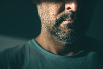 Obraz premium Midlife crisis of middle aged man. Closeup portrait of man in 40s in a depressed state of mind, sad and hopeless.