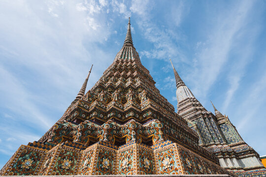 Facade of famous Buddhist temple with ornamental elements in Thailand