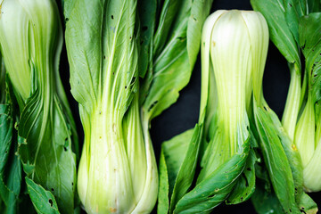 Close up of Vibrant Green Chinese Cabbage, 100% Organic, on a Black Background