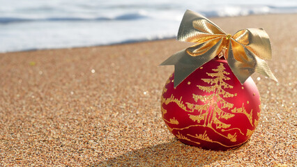 4K Digital image of Christmas tree decoration on the beach sand perfectly optimized for The Frame TV Art. 3840 x 2160 pixels