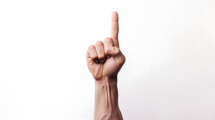 Strong man pointing finger up in white background