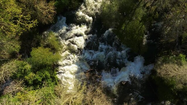 Rapids Flowing Over Rocky Mountains In R&iacute;o de Zas, A Coruna Spain. Slow Motion, Zoom Out