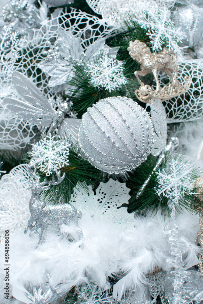 Wall mural christmas tree branches with a decorations