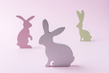 Easter bunnies decoration on blue background. Minimal Easter concept.