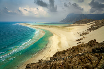 Sandy coast with a lagoon in a nature reserve on the island of Socotra