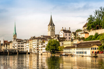 Fototapeta na wymiar Scenic view of historic Zurich city center with famous Fraumunster and river Limmat at Lake Zurich,Switzerland