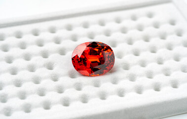 Red Ruby gemstone Round Cut  on white background, close up shot