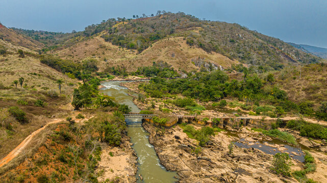 Aerial of an old railway bridge over the Cuvo River (Rio Keve), near confluence with Toeota River, Six Arches Bridge, Conda, Kumbira Forest Reserve, Kwanza Sul, Angola