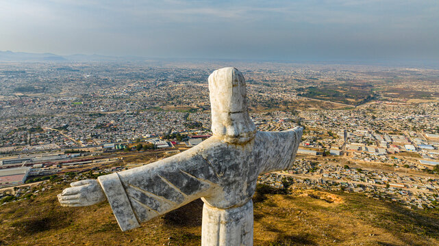 Aerial of the Christ the King Statue, overlooking Lubango, Angola