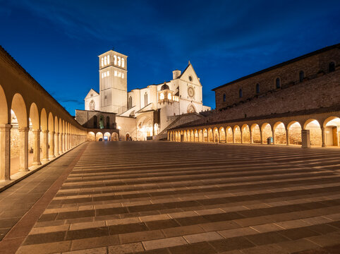 Lower Square of St. Francis and the Basilica of Saint Francis of Assisi, illuminated at night, UNESCO World Heritage Site, Assisi, Perugia, Umbria