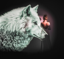 one young girl and a wolf in the dark