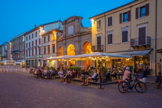 View of restaurant in Piazza Cavour in Rimini at dusk, Rimini, Emilia-Romagna