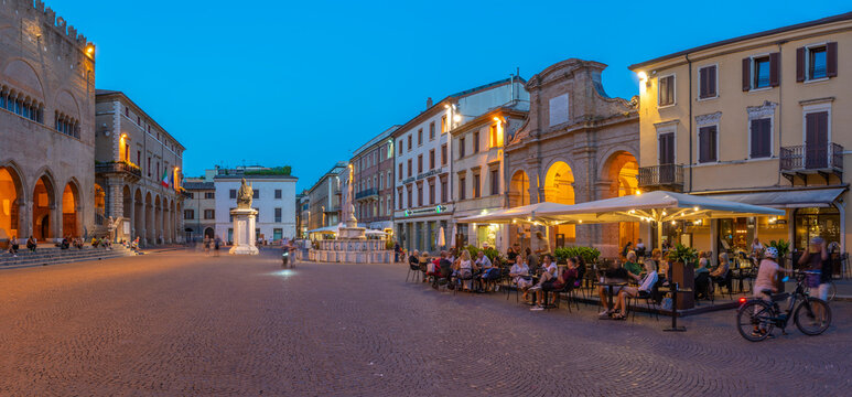 View of restaurant in Piazza Cavour in Rimini at dusk, Rimini, Emilia-Romagna