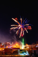 Fireworks in a residential area of Vladivostok in Russia. New Year celebrations in a poor area of a...