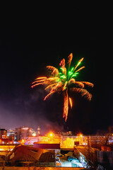 Fireworks in a residential area of Vladivostok in Russia. New Year celebrations in a poor area of a...