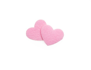 Felt pink heart shapes isolated on white ,top view