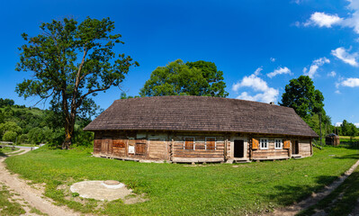Fototapeta na wymiar Ancient wooden village house in Lviv region
