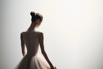 
Artistic faceless portrait of a ballerina, poised in silhouette against a stark white backdrop, subtle textures of the ballet dress
