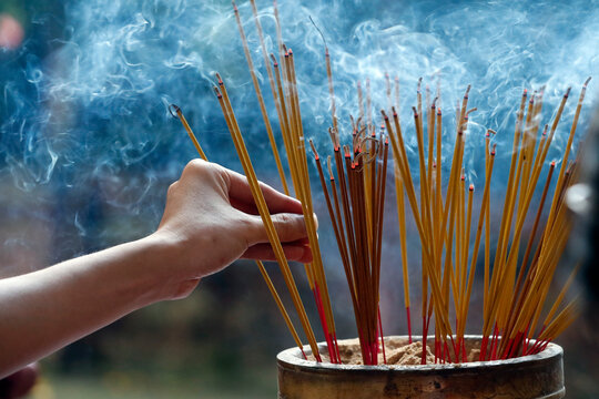 Emperor Jade pagoda (Chua Phuoc Hai), incense sticks on joss stick pot burning, smoke used to pay respect to the Buddha, Ho Chi Minh City, Vietnam, Indochina