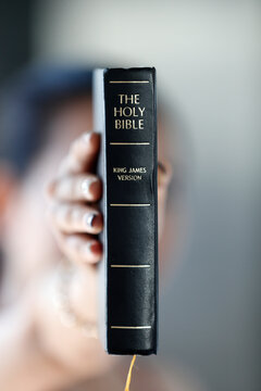 Catholic woman with the Holy Bible in hands, Vietnam, Indochina