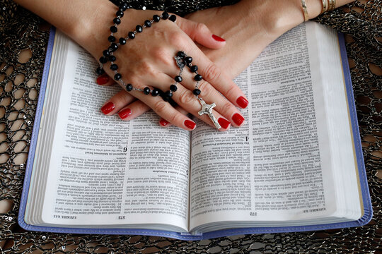 Christian woman reading the Bible, Vietnam, Indochina