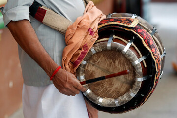 Musician playing a Thavil, a traditional Indian drum, Sri Mahamariamman Hindu Temple, Kuala Lumpur. Malaysia