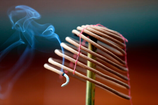 Burning spiral incense sticks in Taoist ceremony, Mau Son Taoist temple, Sapa, Vietnam, Indochina