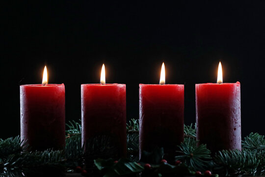 Natural Advent wreath or crown with four burning red candles, Christmas composition, France