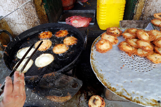 Traditional Nepalese restaurant, fried Sel Roti, the traditional breakfast for Nepali people, Kathmandu, Nepal