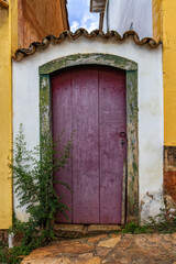 Colorful door of a colonial house in the historical town of Tiradentes, Minas Gerais, Brazil
