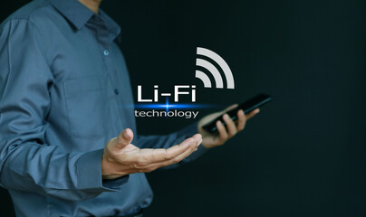 Li-Fi technology, internet and network, businessman has Li-Fi in hand on virtual screen.