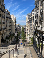 Charming Parisian Street Scene with Elegant Staircase: Urban Architecture and European Landmark in France
