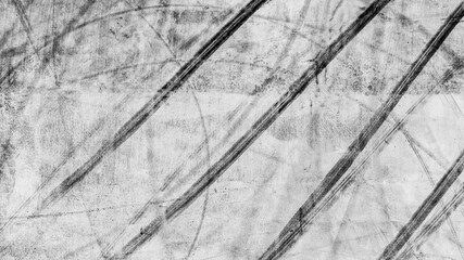 Tire track mark on asphalt tarmac road race track texture and background, Abstract background black...
