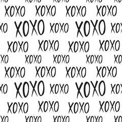 XOXO seamless pattern black and white. Cool background for classy textures design.