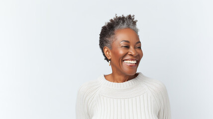 Portrait of a senior old black african american woman with grey hair, studio photo, looking away isolated on white background. 