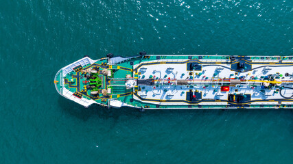 Aerial top view LPG gas ship, Ship tanker gas LPG top view on the sea for transportation, Liquefied Petroleum Gas tanker or LPG anchored in deep blue ocean sea.