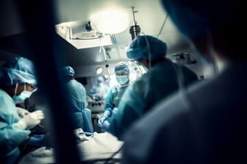 Surgical medical operation, anesthesia in progress, team of surgeons and nurses - obrazy, fototapety, plakaty