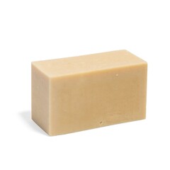 Bar of natural chunky soap on white background with strong shadow 