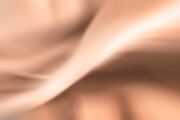 Blurred abstract gradient wave natural peach fuzz background
